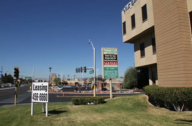 Gustave Anaya operated two similar businesses, Mortgage Capital USA and Executive Capitals, out of two suites in this office building on Flamingo and Pecos Roads. On Wednesday, March 21, it appeared as.though one office had been shuttered, while another remained open.